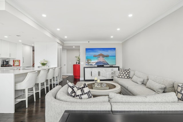 living area with crown molding, recessed lighting, and dark wood finished floors