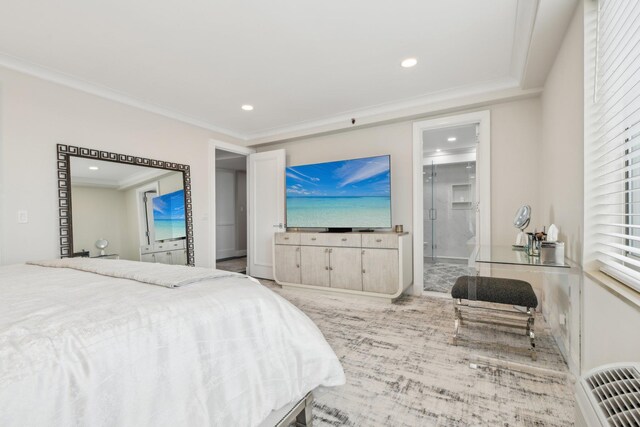 bedroom featuring recessed lighting, ornamental molding, and ensuite bathroom
