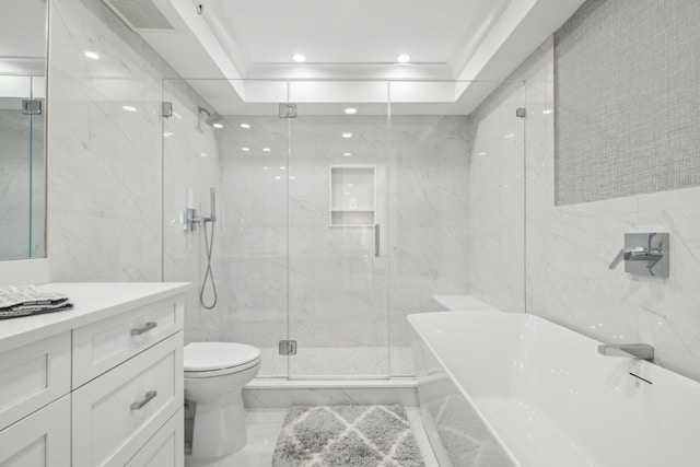 full bath featuring a soaking tub, a marble finish shower, tile walls, marble finish floor, and vanity