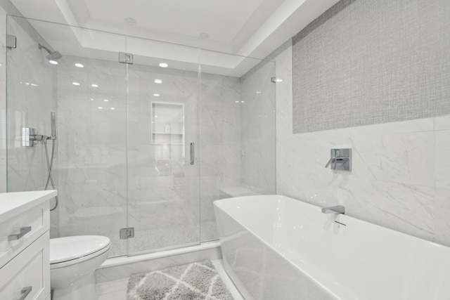 bathroom featuring a marble finish shower, toilet, a freestanding tub, marble finish floor, and vanity
