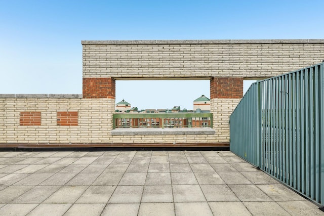 view of patio / terrace with a balcony