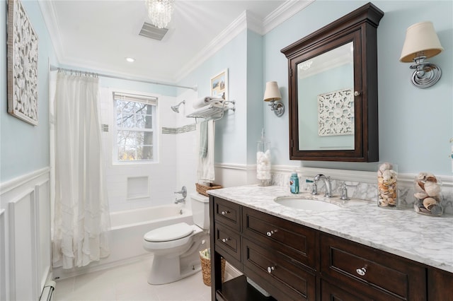 bathroom featuring visible vents, toilet, shower / bath combo with shower curtain, crown molding, and wainscoting
