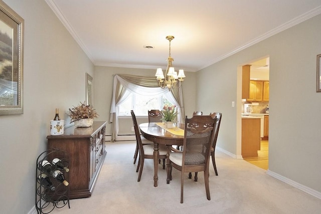 dining room featuring a notable chandelier, visible vents, light carpet, baseboards, and ornamental molding