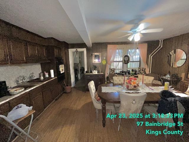 dining room featuring ceiling fan and light wood-type flooring