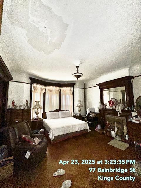 bedroom with a textured ceiling