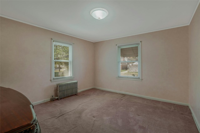 unfurnished bedroom featuring crown molding, carpet flooring, baseboards, and radiator