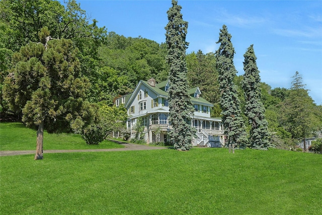 225 River Rd, Nyack, NY 10960 - view of home's exterior featuring a yard and a chimney