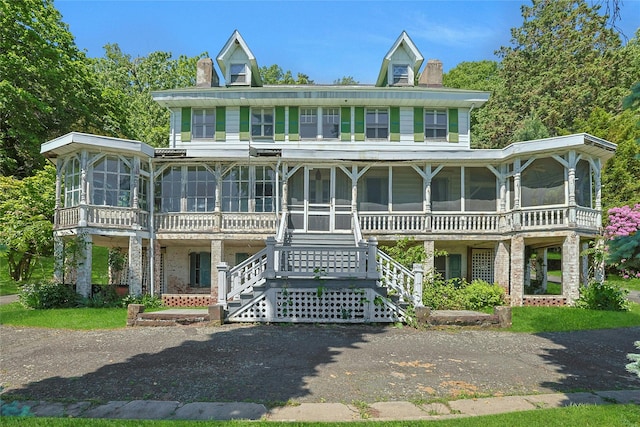 225 River Rd, Nyack, NY 10960 - view of front of home with a sunroom and a chimney