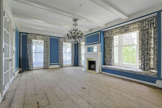 225 River Rd, Nyack, NY 10960 - unfurnished living room featuring a chandelier, beamed ceiling, a fireplace with raised hearth, and baseboards