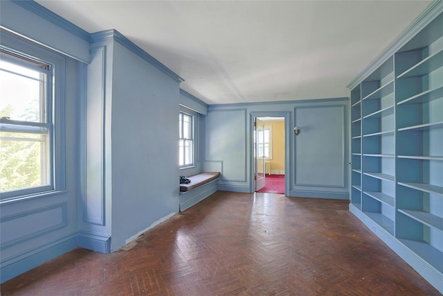 225 River Rd, Nyack, NY 10960 - empty room featuring built in shelves, baseboards, and ornamental molding