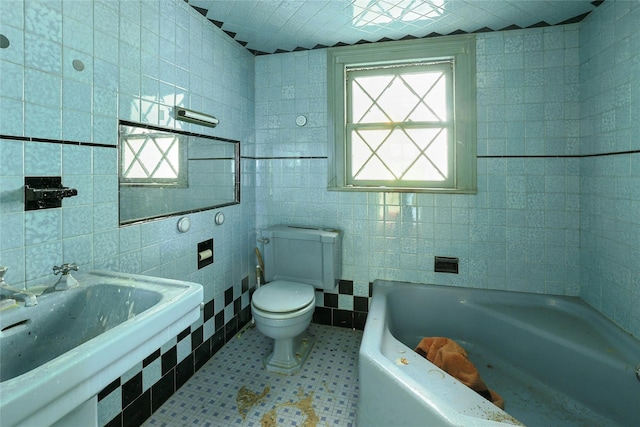 225 River Rd, Nyack, NY 10960 - full bathroom featuring tile walls, a bath, toilet, and a sink