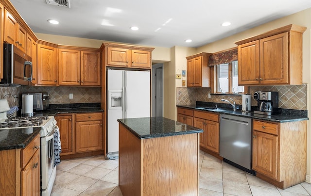 100 Glen Cove Rd, Greenvale, NY 11548 - kitchen with a sink, brown cabinetry, a center island, stainless steel appliances, and backsplash