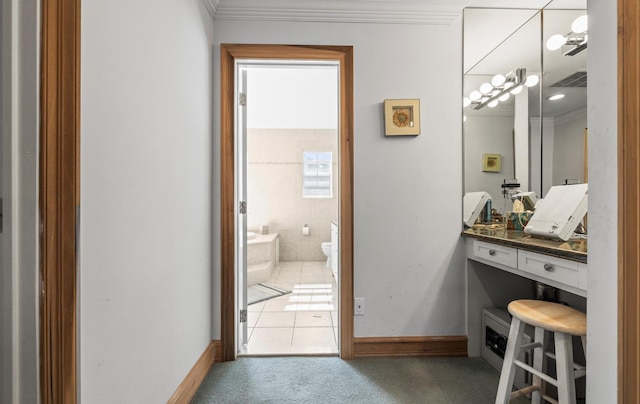 100 Glen Cove Rd, Greenvale, NY 11548 - full bathroom with crown molding, a garden tub, vanity, toilet, and baseboards