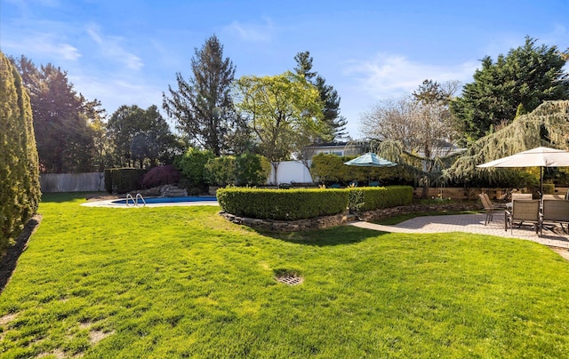100 Glen Cove Rd, Greenvale, NY 11548 - view of yard featuring fence, a fenced in pool, and a patio