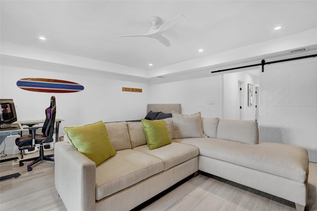 923 Oceanfront, Long Beach, NY 11561 - living room with light wood-style flooring, recessed lighting, ceiling fan, and a barn door
