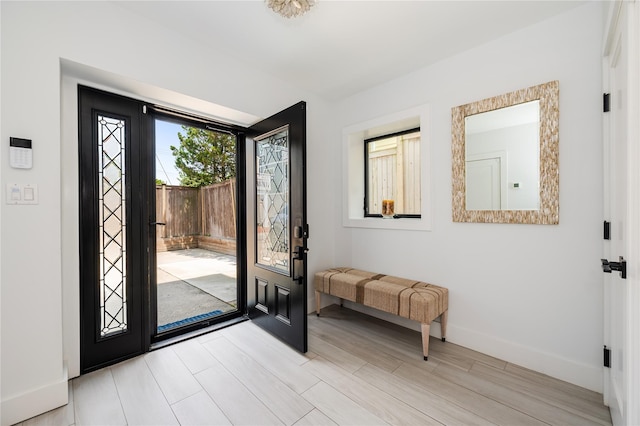 923 Oceanfront, Long Beach, NY 11561 - entrance foyer featuring baseboards and light wood-type flooring