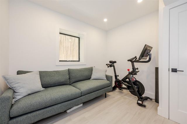 923 Oceanfront, Long Beach, NY 11561 - exercise room with light wood-type flooring, recessed lighting, and baseboards