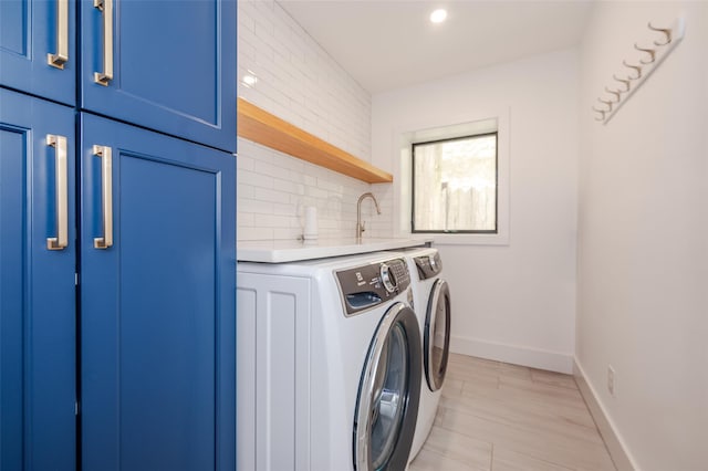 923 Oceanfront, Long Beach, NY 11561 - laundry area featuring cabinet space, separate washer and dryer, baseboards, and recessed lighting