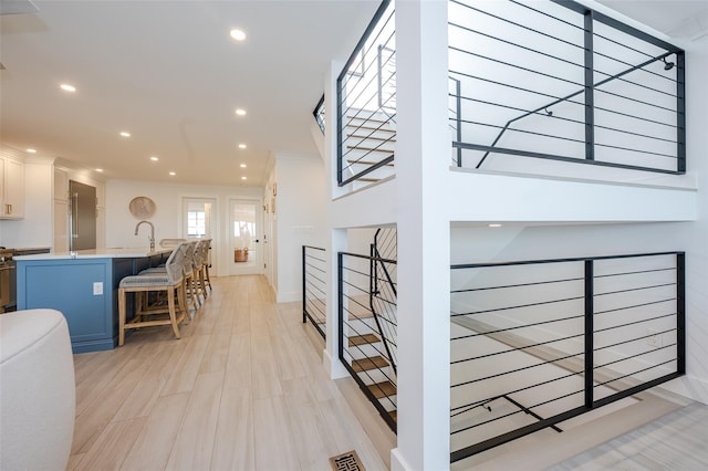923 Oceanfront, Long Beach, NY 11561 - stairs featuring recessed lighting and ornamental molding