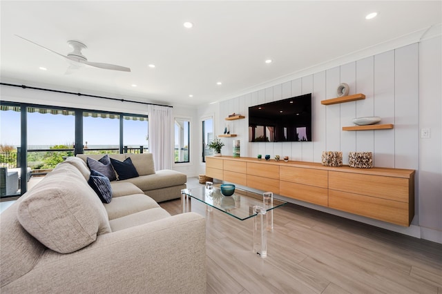 923 Oceanfront, Long Beach, NY 11561 - living room with plenty of natural light, crown molding, a ceiling fan, light wood-type flooring, and recessed lighting