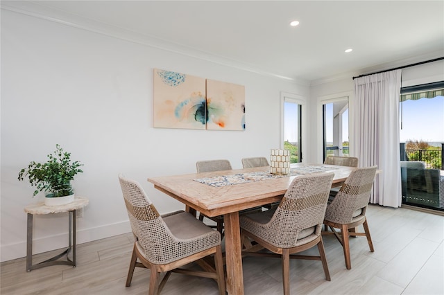 923 Oceanfront, Long Beach, NY 11561 - dining space featuring ornamental molding, recessed lighting, baseboards, and light wood finished floors