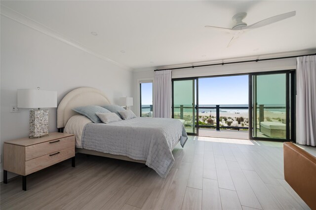 923 Oceanfront, Long Beach, NY 11561 - bedroom featuring access to exterior, ornamental molding, and light wood-style flooring