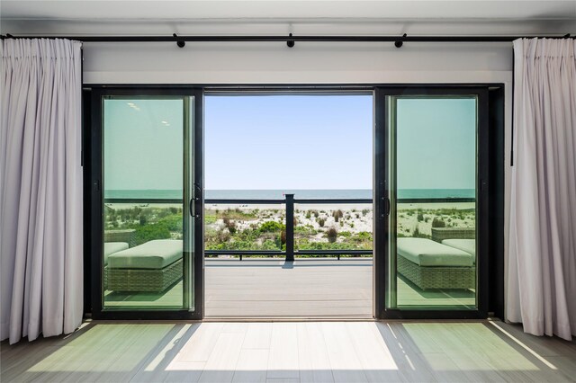 923 Oceanfront, Long Beach, NY 11561 - entryway with a water view, plenty of natural light, and wood finished floors