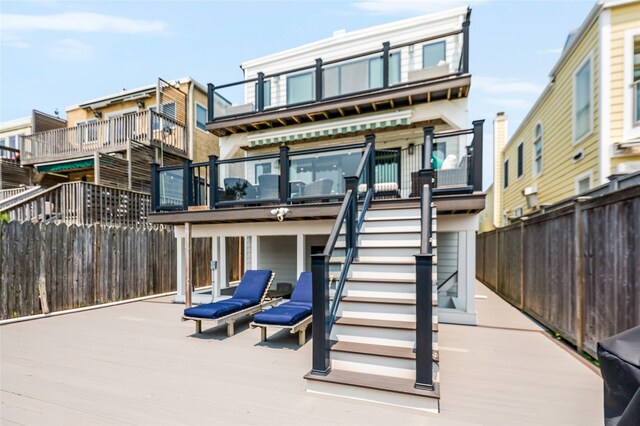 923 Oceanfront, Long Beach, NY 11561 - rear view of house with stairs and a deck