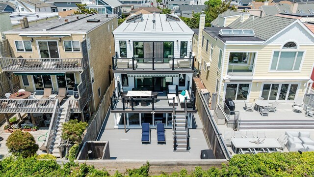 923 Oceanfront, Long Beach, NY 11561 - back of property with a residential view and a balcony