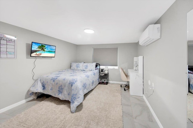 bedroom featuring baseboards and a wall unit AC