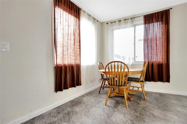 71 E Kissimee Rd, Lindenhurst, NY 11757 - dining room with baseboards
