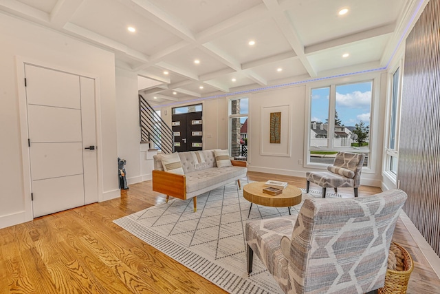296 Division Ave, Hicksville, NY 11801 - living area featuring light wood-style flooring, coffered ceiling, beam ceiling, baseboards, and recessed lighting