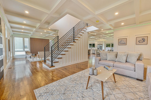 296 Division Ave, Hicksville, NY 11801 - living area with coffered ceiling, stairs, beamed ceiling, healthy amount of natural light, and light wood-type flooring