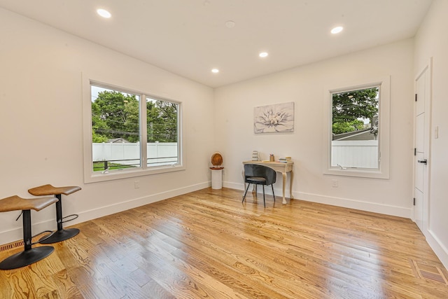 296 Division Ave, Hicksville, NY 11801 - interior space featuring healthy amount of natural light, recessed lighting, light wood finished floors, and baseboards