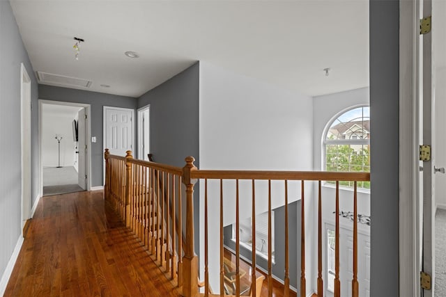 2066 Independence Dr, New Windsor, NY 12553 - hallway featuring wood finished floors, an upstairs landing, and attic access