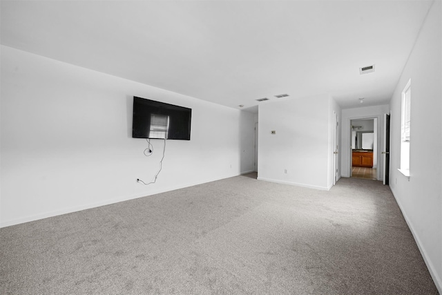 2066 Independence Dr, New Windsor, NY 12553 - unfurnished living room with carpet and baseboards