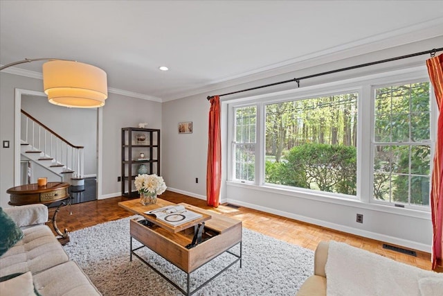 living room with crown molding, recessed lighting, baseboards, visible vents, and stairway
