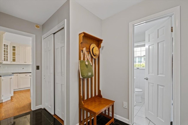 mudroom featuring baseboards