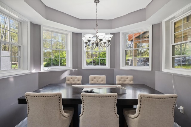 dining room with a chandelier