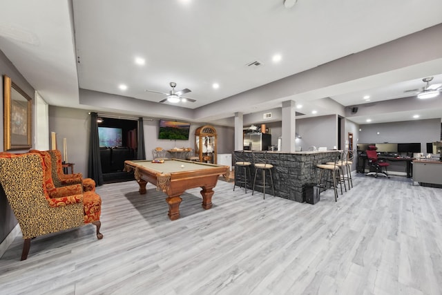 rec room with visible vents, bar, light wood finished floors, and pool table
