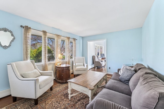 24 Linda Ln, East Moriches, NY 11940 - living room with baseboards and wood finished floors