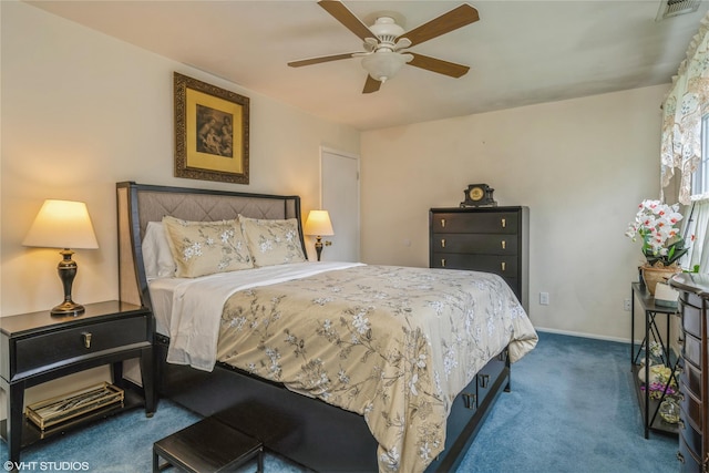carpeted bedroom featuring ceiling fan, baseboards, and visible vents