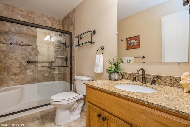 full bath with toilet, an enclosed shower, and vanity