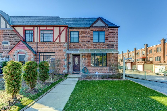67-54 Groton St, Forest Hills, NY 11375 - multi unit property featuring a front lawn and brick siding