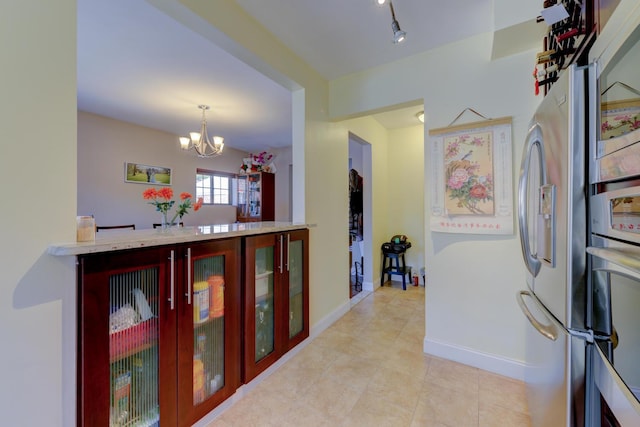 67-54 Groton St, Forest Hills, NY 11375 - hall featuring light tile patterned floors, baseboards, and an inviting chandelier