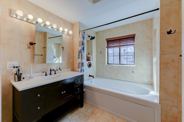 67-54 Groton St, Forest Hills, NY 11375 - bathroom with tile walls, tile patterned floors, vanity, and shower / bath combination with curtain