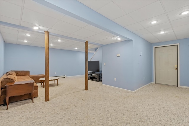 finished below grade area featuring recessed lighting, carpet flooring, and a paneled ceiling