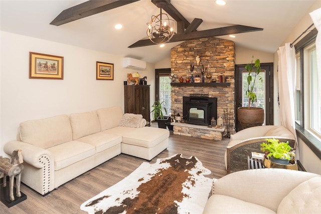 living room featuring vaulted ceiling with beams, wood finished floors, a notable chandelier, and a wall unit AC