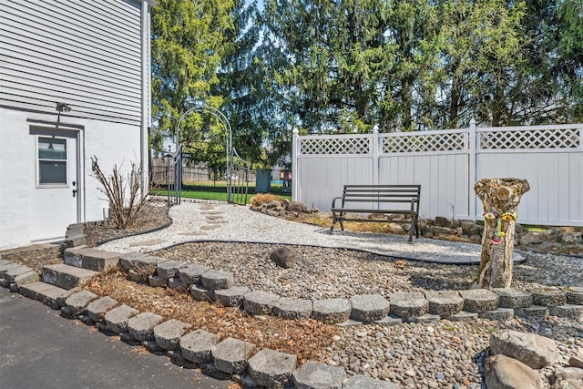 view of yard with a fenced backyard