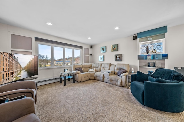 living room with recessed lighting, carpet, and a healthy amount of sunlight